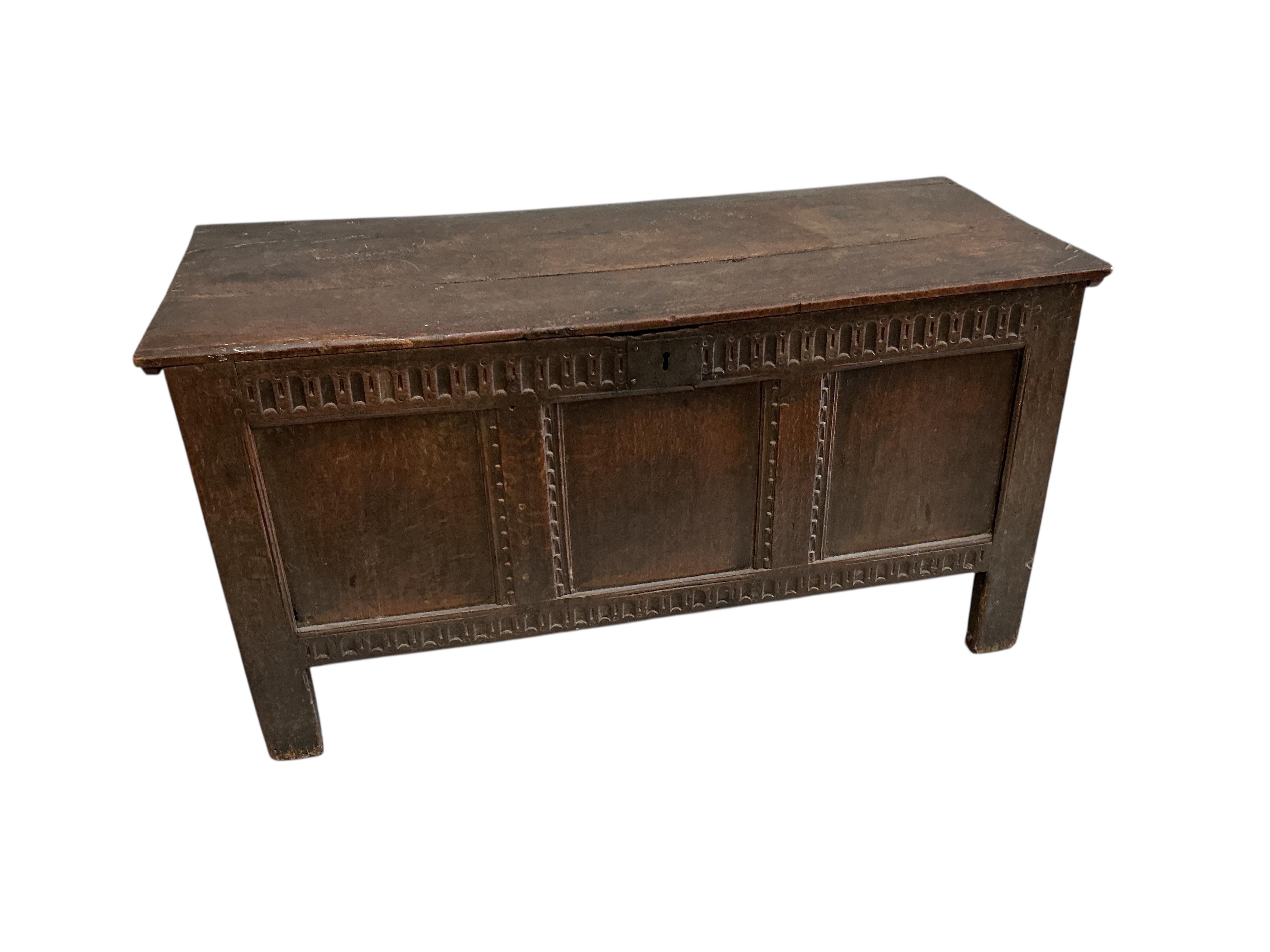 An 18th century oak coffer, width 122cm, depth 49cm, height 63cm